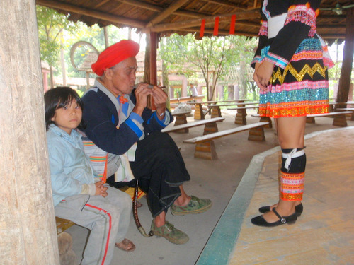 A ceremonial rice wine is offerred to the senior elder.